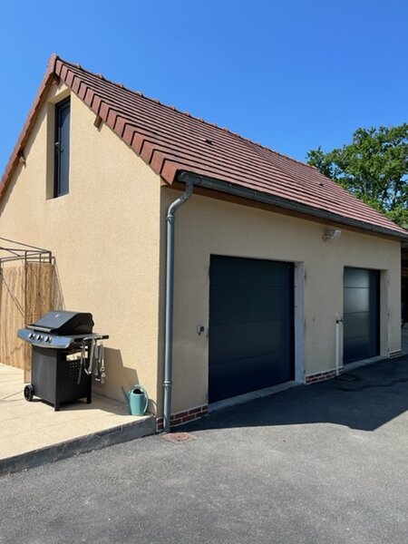 Réalisation Thézard Menuiserie — Portes de garage